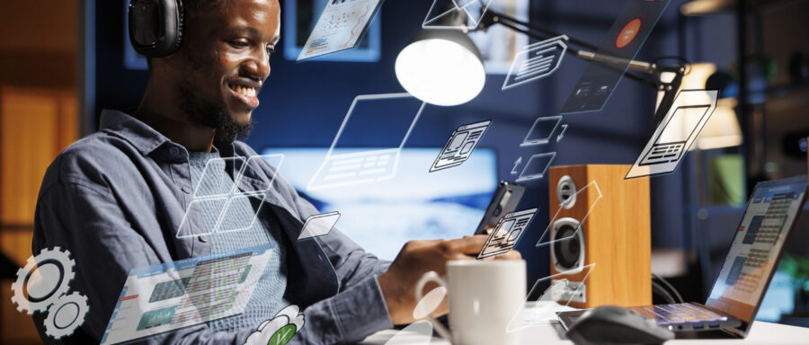 Business person using laptop multitasking to finish daily startup tasks, internet of things concept. Uses artificial intelligence optimization system for productivity, access pc smart things menu.